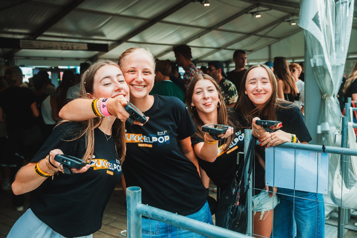 Four Pukkelpop crew members holding their PDA scanners